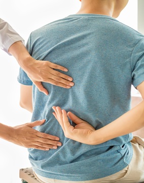 Why seeking professional help for mid-back pain is important